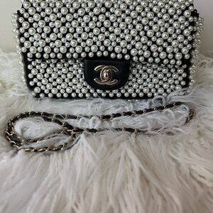 CHANEL Pearl Mini Flap 19s  - $12k